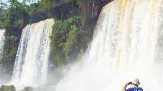 A man observing Iguazu Falls in Argentina