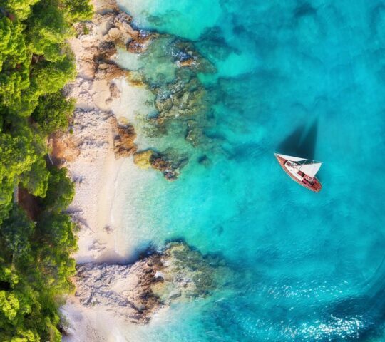 Glide across turquoise waters aboard a luxury yacht