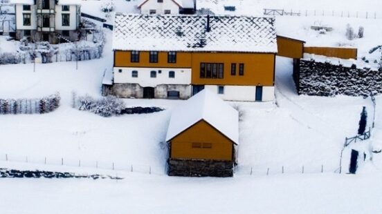 Aerial view of Amot hotel covered in snow, Norway