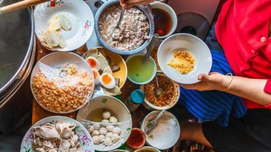 Aerial view of a woman preparing traditional Vietnamese food