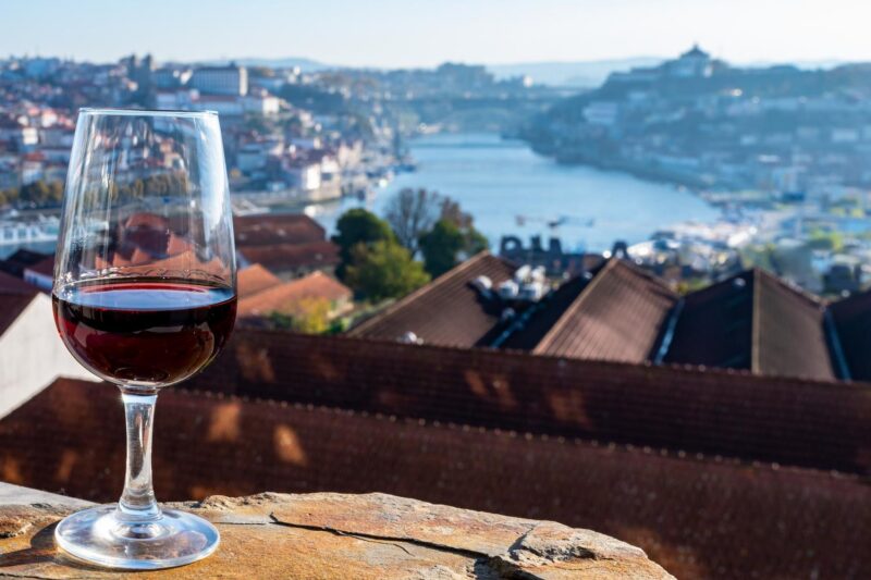 A glass of port with a view over Porto