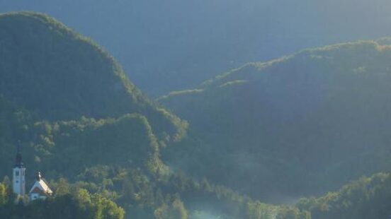Kayaking in Lake Bled Slovenia surrounding by its alpine beauty