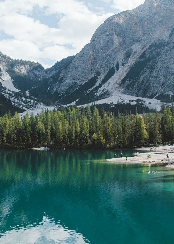 The Dolomites in Italy in a sunny day enjoying bathing and swimming