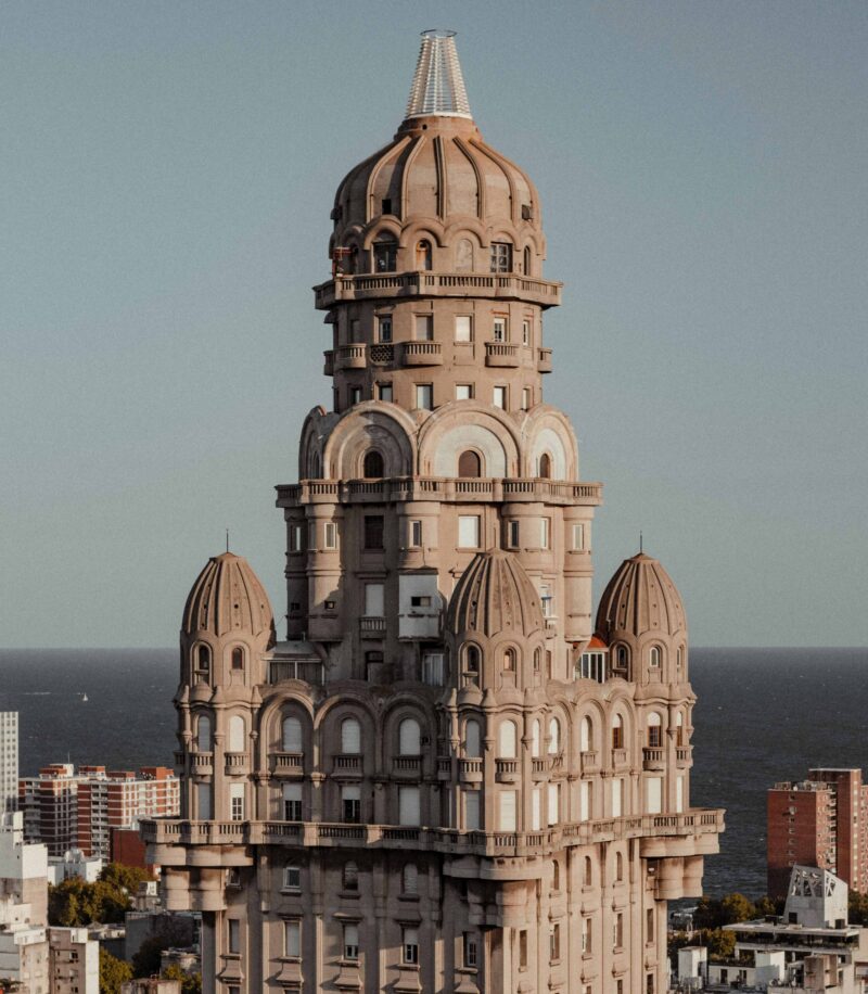 Emblematic building “Palacio salvo” seen in the foreground. Located in “Plaza Independencia” in the city of Montevideo, capital of the Oriental Republic of Uruguay. South American country.