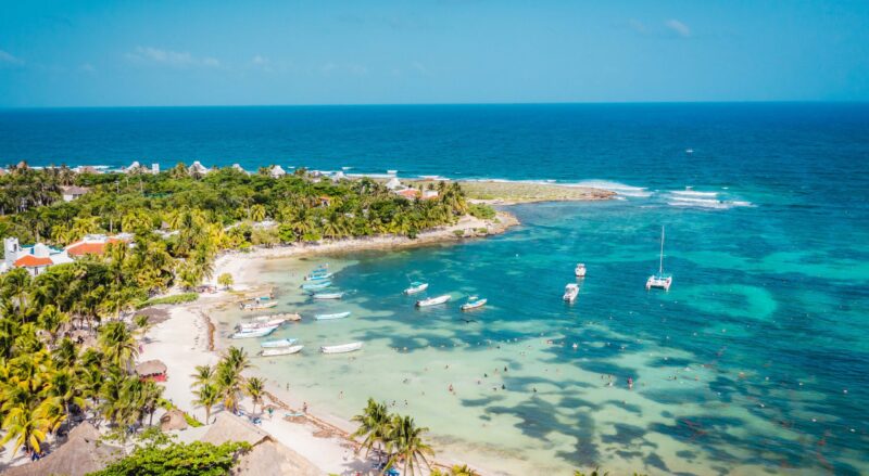 Aerial view of the Akumal Bay in Quintana Roo, Mexico. Caribbean Sea, coral reef, top view. Beautiful tropical paradise beach
