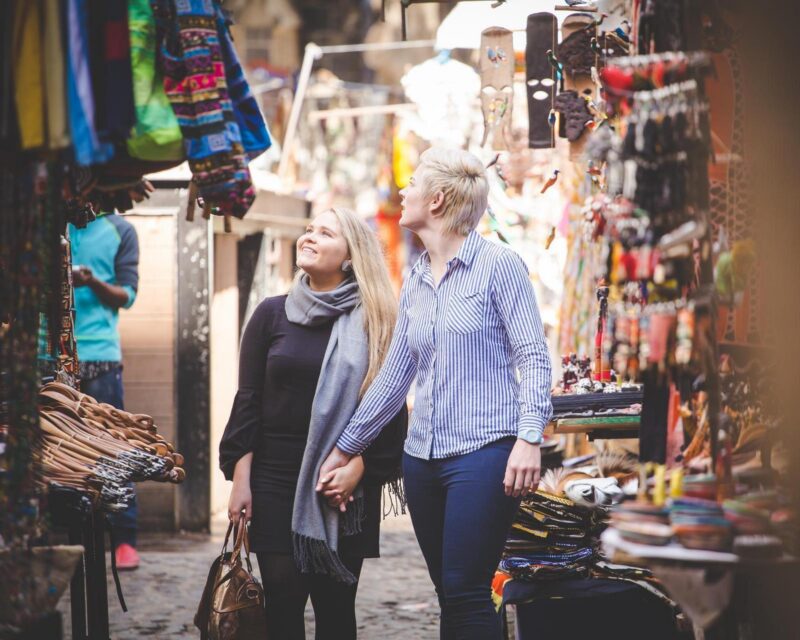 Two women browse a market in Cape Town, South Africa