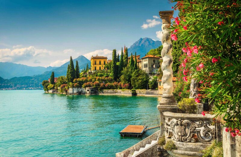 Famous luxury villa Monastero, stunning botanical garden decorated with mediterranean oleander flowers, lake Como, Varenna, Lombardy region, Italy, Europe