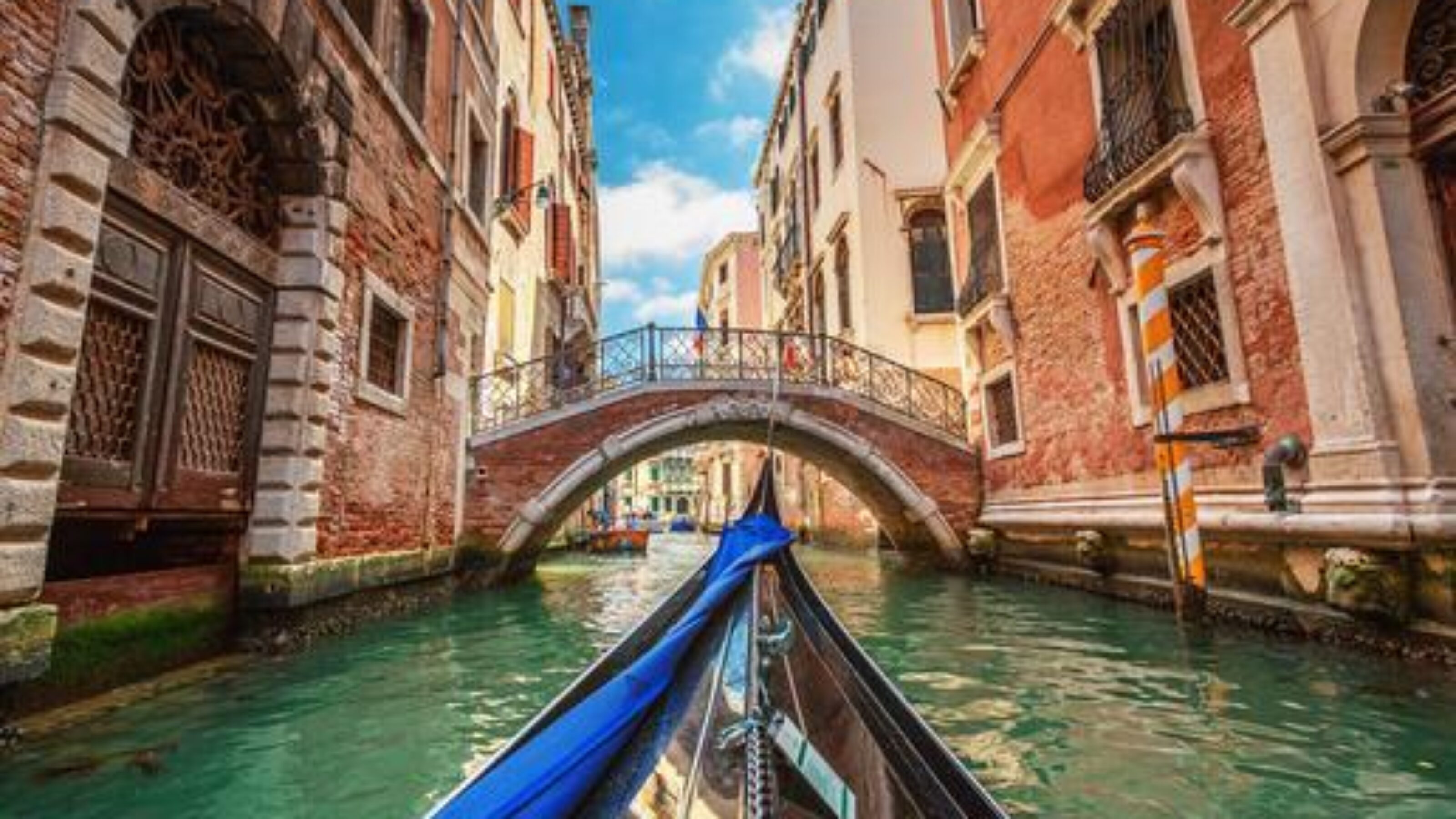 View from gondola during the ride through the canals of Venice in Italy