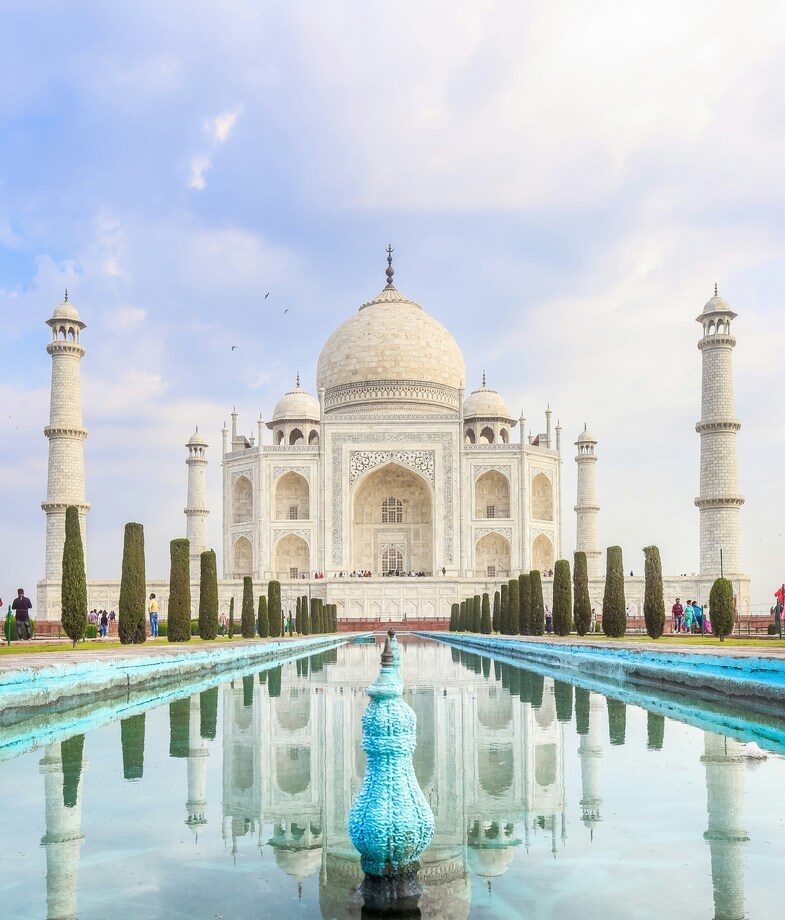 The gorgeous white marble of Indiax27;s Taj Mahal and the weathered stone of Luang Prabangx27;s temples, Laos.