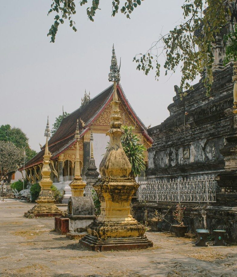 The gorgeous white marble of Indiax27;s Taj Mahal and the weathered stone of Luang Prabangx27;s temples, Laos.