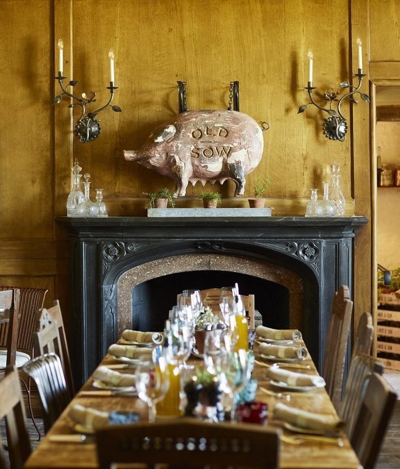 The cosy dining room at The Pig at Harlyn Bay and the organic farm at The Rooster on the island of Antiparos, Greece.