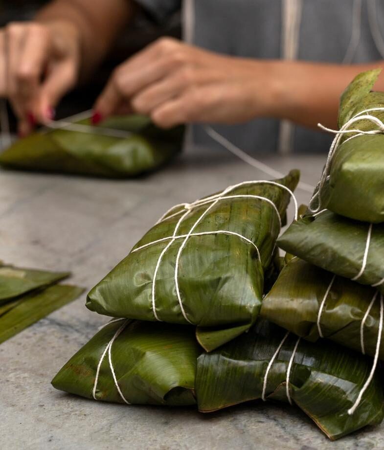 Different flavours of aguas frescas, and making tamales