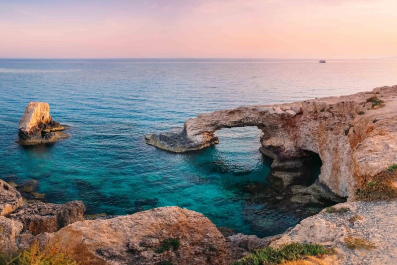 Ayia Napa, Cyprus landscape with beautiful love rock bridge on mediterranean sea at sunset