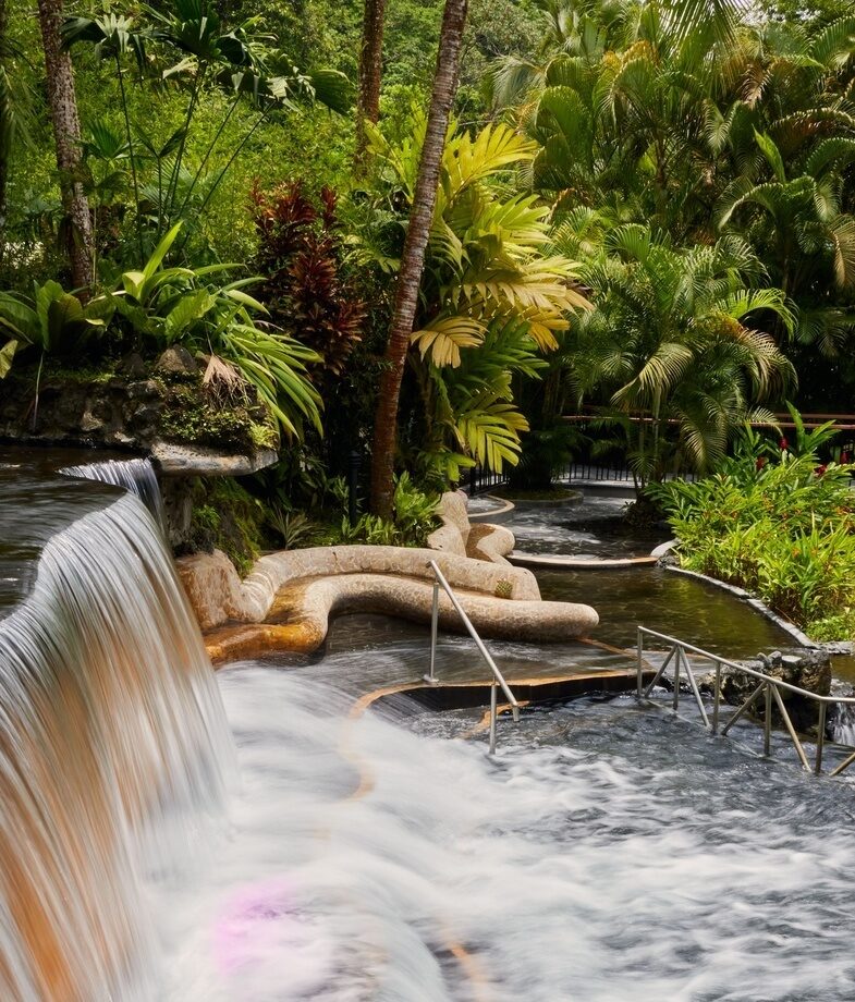 Visiting the Tabacón geothermal waterfall in the Arenal volcano area and learning how to make cacao from scratch on a traditional Costa Rican farm.