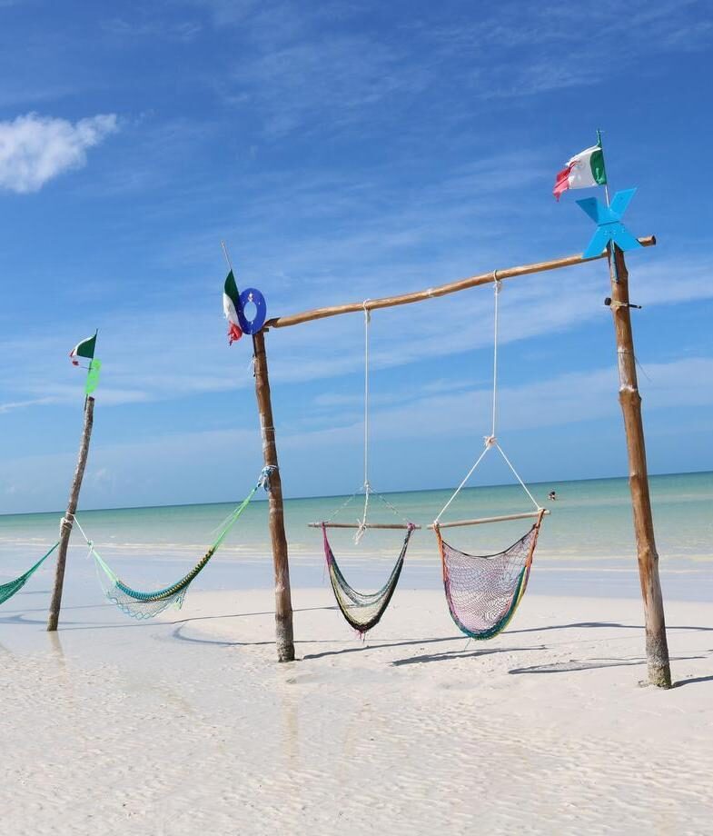 Hammocks strung above the shallow waters of Isla Holbox