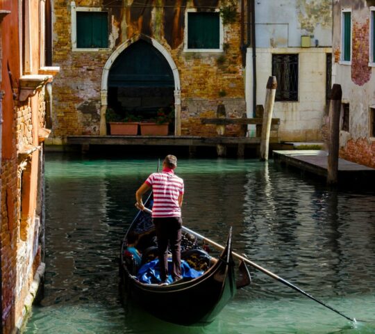Gondolas glide along Venice’s world famous waterways