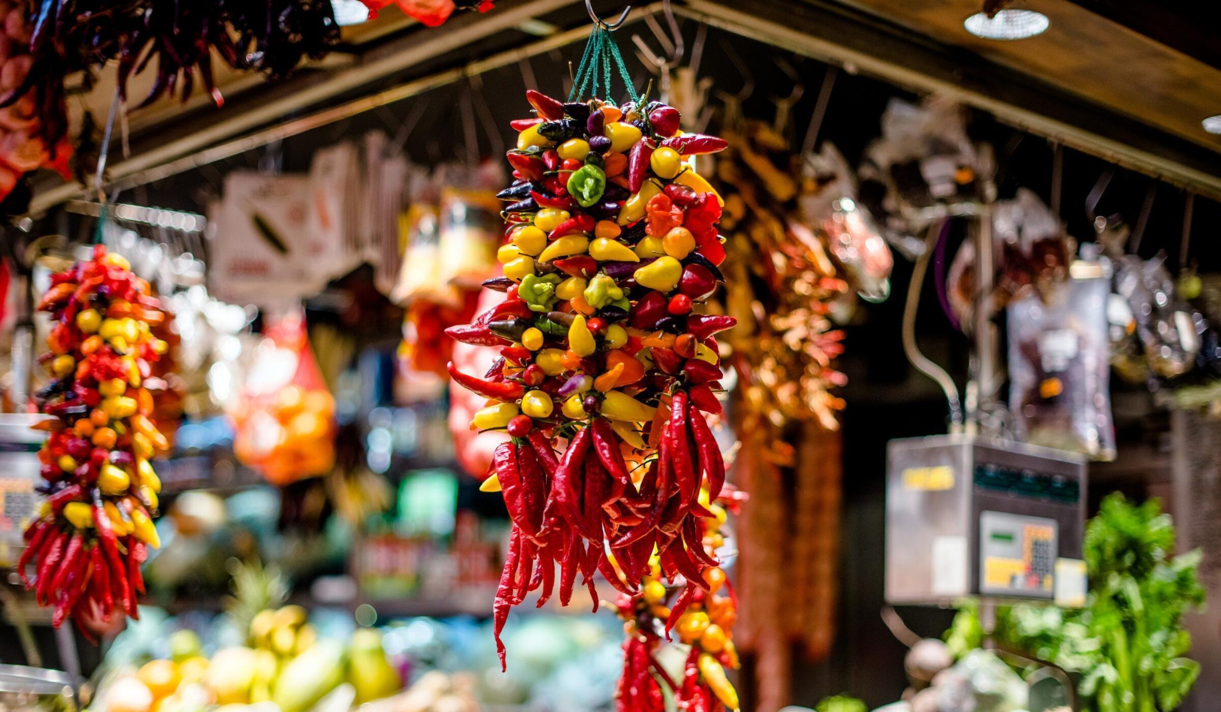 a bunch of hot peppers on the market in Spain