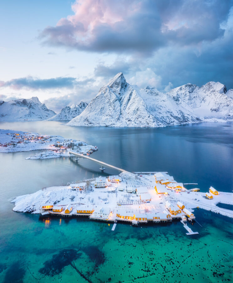 Aerial view on the Hamnoy village, Lofoten Islands, Norway. Landscape in winter time during blue hour. Mountains and water. Norge image