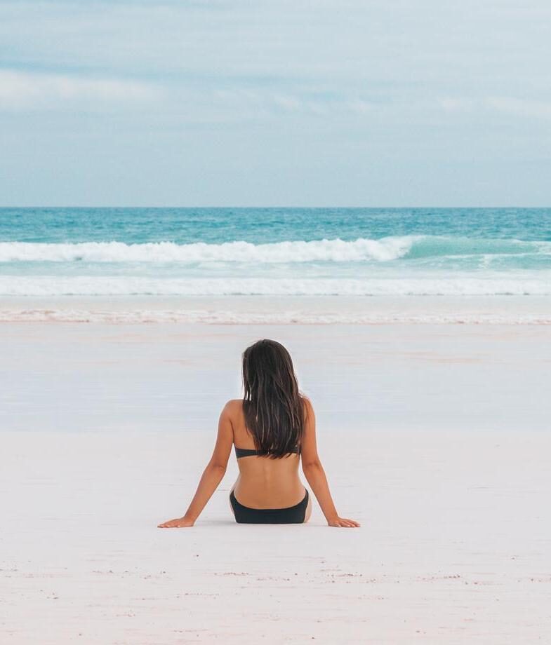 Relax on the soft white sands of Tortuga Bay or visit the historic Post Office Bay on Floreana Island.