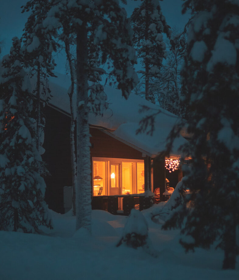 The striking red dunes and sun-bleached trees of Namibia’s Namib Desert and a cosy snow-covered lodge glowing warmly in the winter forests of Finland.