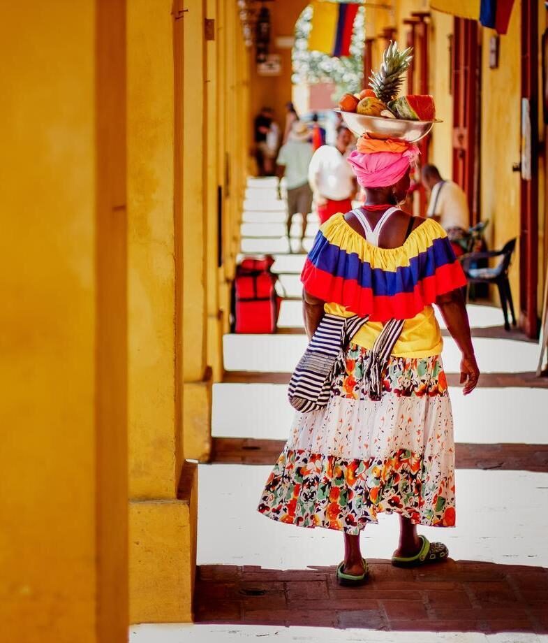 Cartagenax27;s fruit sellers are as colourful as the streets themselves, and San Agustínx27;s ancient statues still stand proudly today