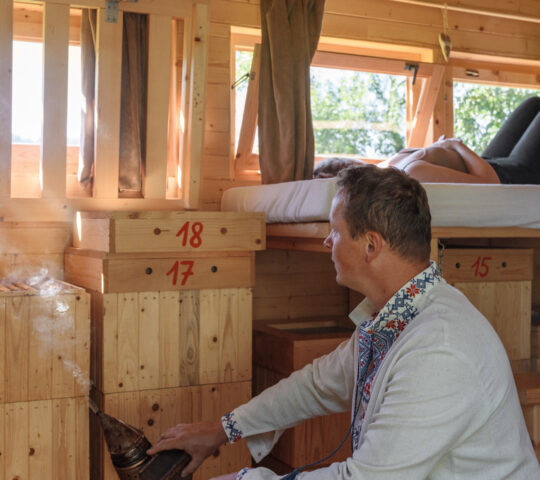 Natural, cool smoke helps keep the bees calm during apitherapy
