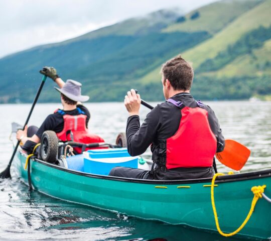 Gliding across Loch Lochy on a canoe trip