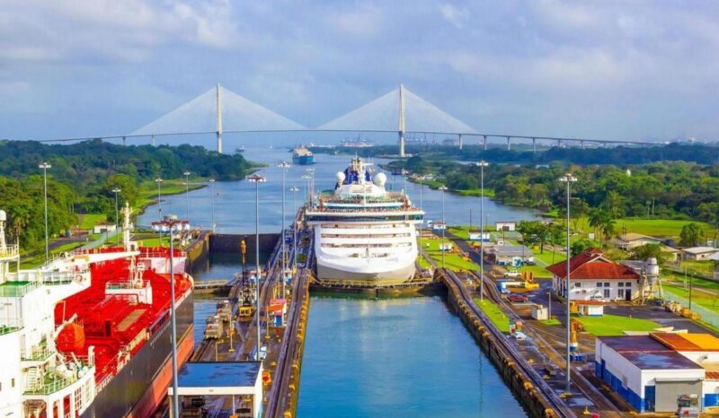 View of Panama Canal from cruise ship panama, canal, ship, transport, cargo, transportation, shipping, sea, water, america, vessel, lock, ocean, trade, container, entrance, cruise, nature, travel, central, boat, gatun, engineering, vacation, tourism, waterway, gate, lake, authority, passenger, transit, deck, destination, watercraft, holiday, channel, natural, scenery, miraflores, commerce, atlantic, gates, locks, landmark, navigation, work, containers, technology, tree View of Panama Canal from cruise ship at Panama