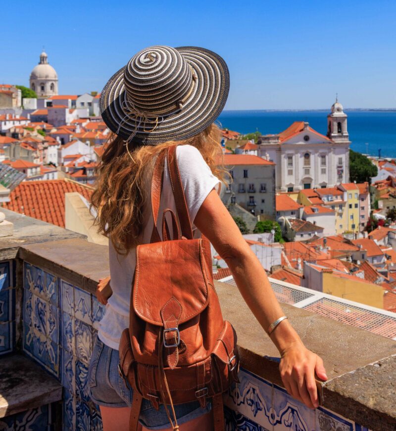 Woman tourist enjoying panoramic view of Lisbon city landscape- Portugal