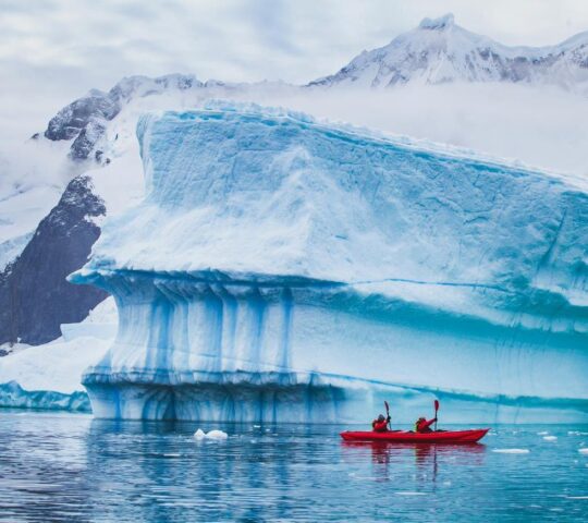 Kayak past incredible Arctic scenery