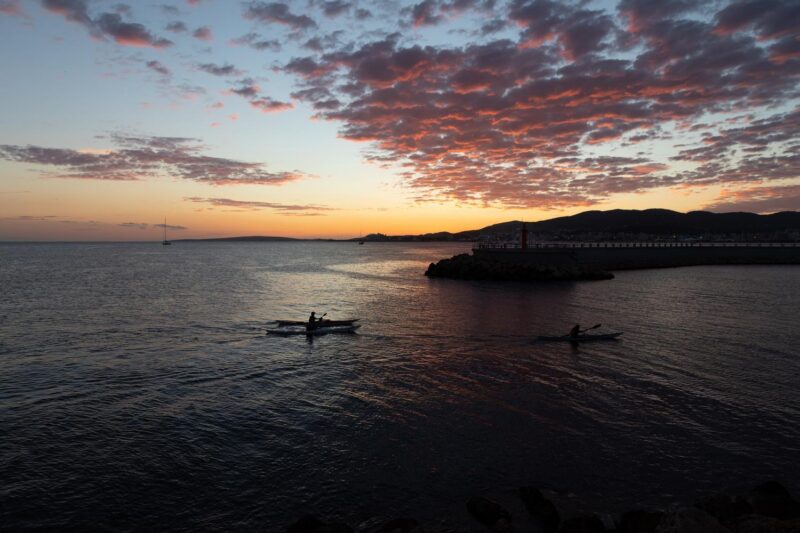 family trip Mallorca kayaking in during sunset