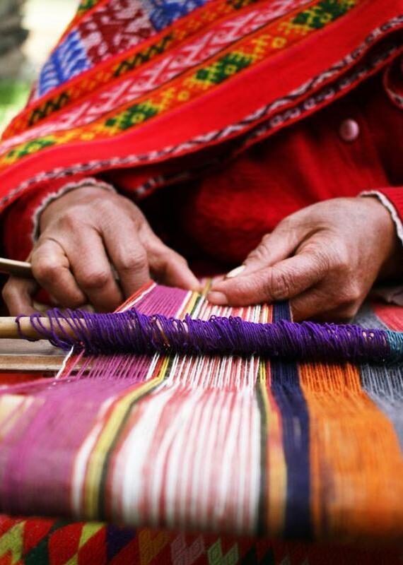 Close up of a woman weaving