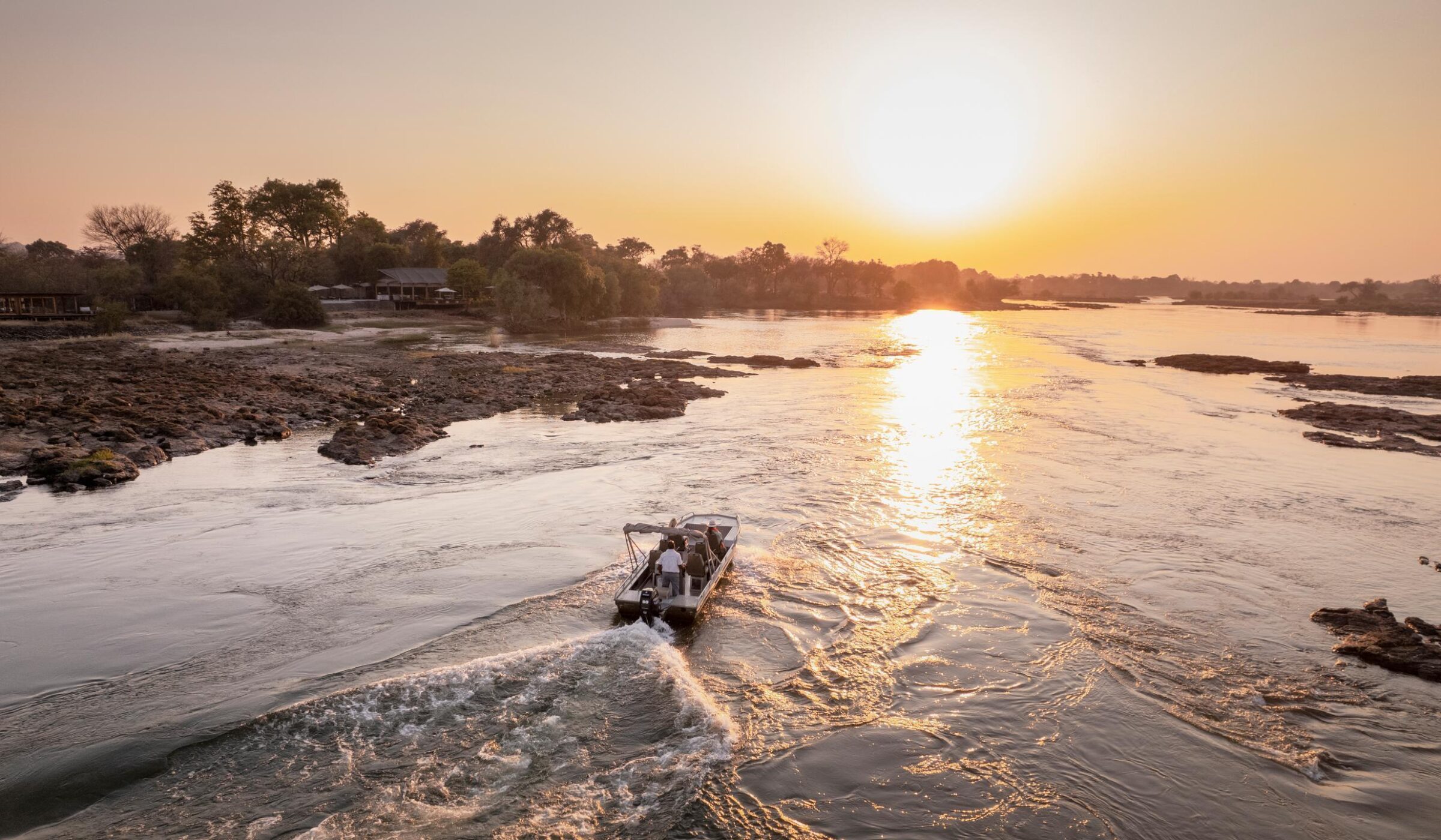 Zambia boat family trip during sunset