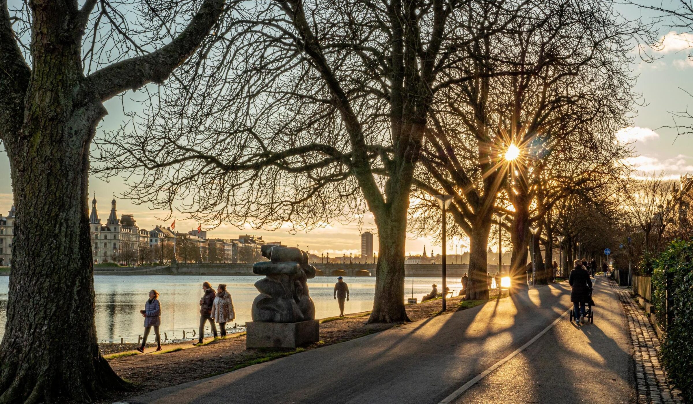 family walking in in Denmark during the peaceful sunset