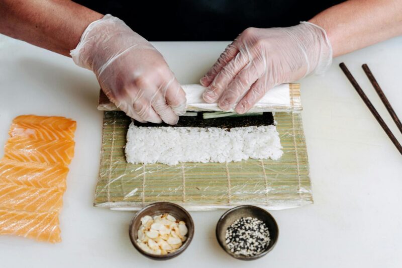 a private sushi chef making traditional japanese dishes