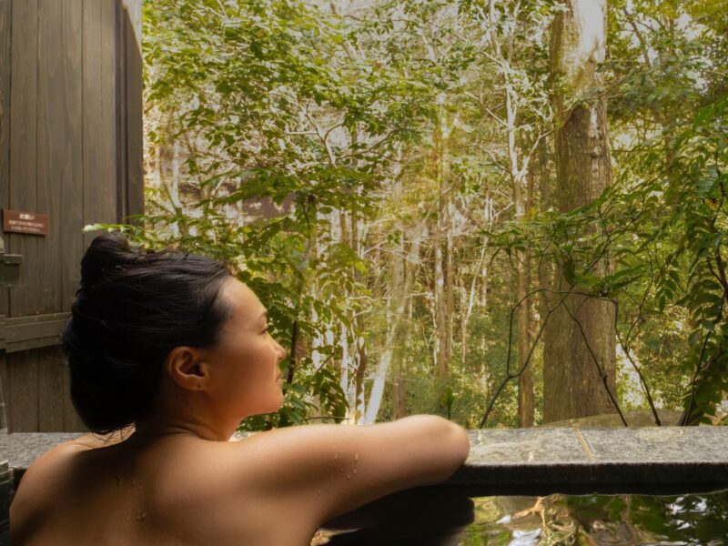 Woman Bathes in Forest wellness Japan