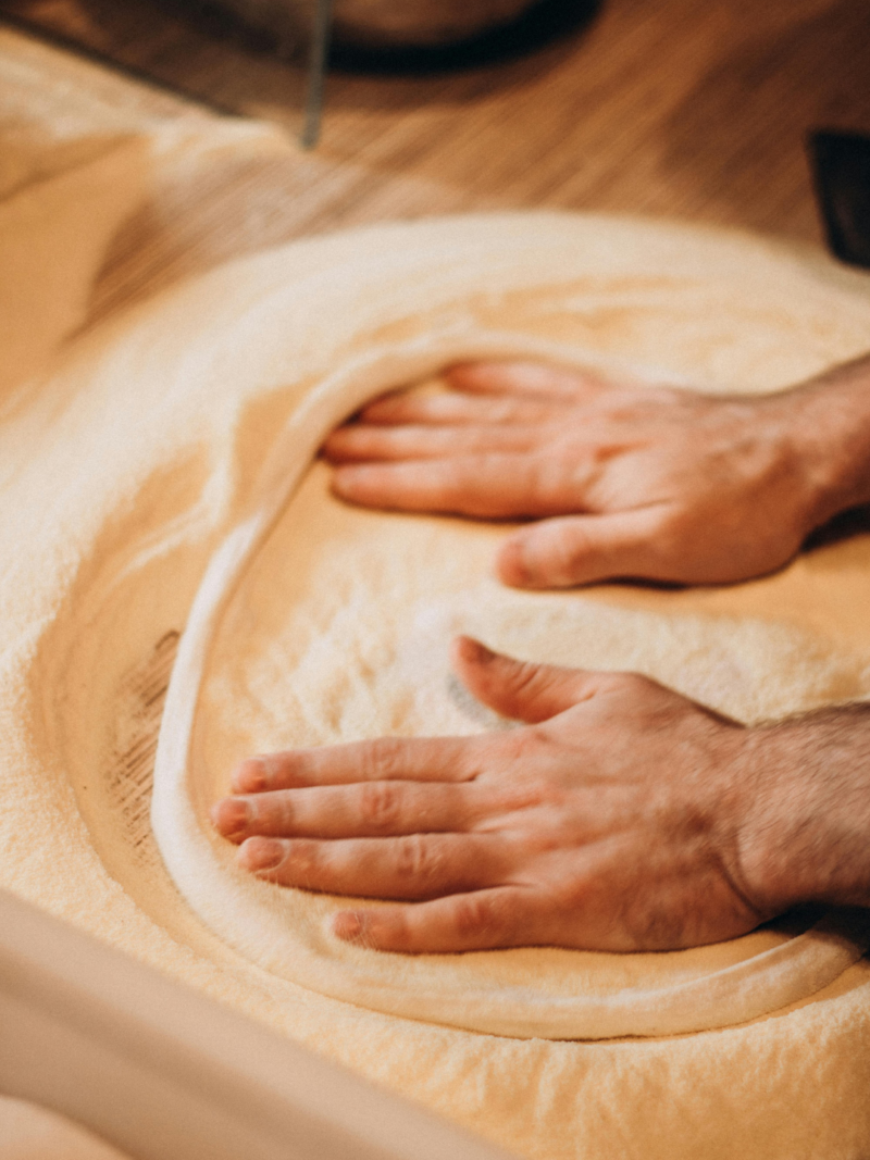 Pizza making in Italy using your hands to make the base