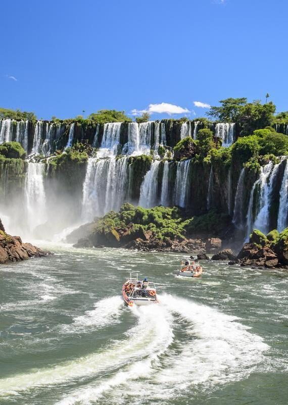 Massive waterfalls surrounded by rainforest at Iguazu Falls in Brazil.