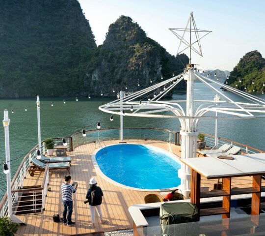 Take a moment to soak up the views of Halong Bay from the comfort of your luxury cruise.