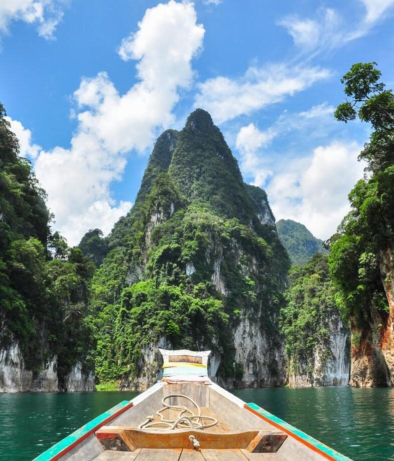 Hike to Haew Suwat waterfall or take a boat ride across Cheow Larn lake