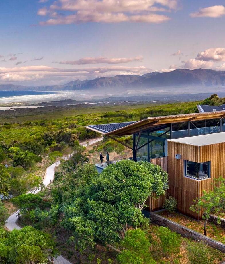 Grootbos Garden Lodge looking out over the landscape above Walker Bay, and the exclusive mountain villa at Boschendal set beneath dramatic peaks in the Franschhoek Valley.