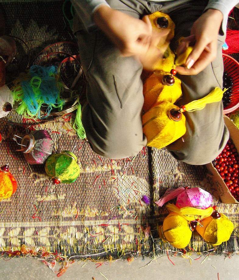 Get closer to Vietnamese culture by trying crafts in Hoi An or street food in Hanoi