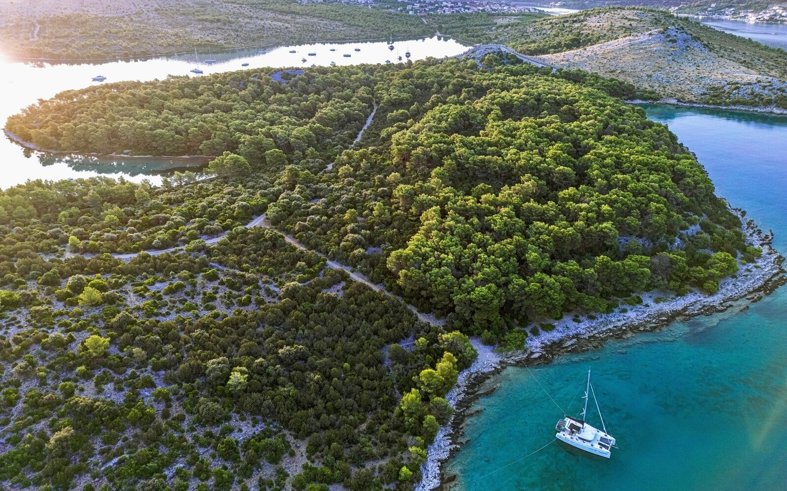 Sail Croatia’s Dalmatian coast and enjoy secluded moments around Oštrica Peninsula near Šibenik.