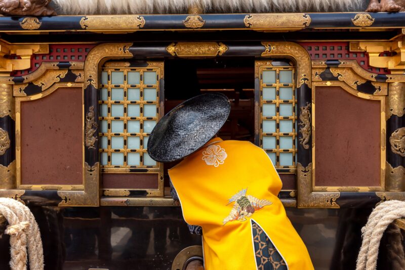 Japanese man wearing traditional clothes during annual Takayama festival in Japan